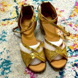 Little girls cute, gold, strap-up heels